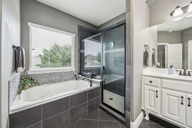 1017 Appalachian Ln, Savannah, TX 76227 - full bathroom with tile patterned floors, a bath, vanity, and a shower stall
