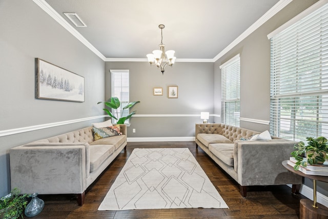 1017 Appalachian Ln, Savannah, TX 76227 - living area with plenty of natural light, dark wood-type flooring, a chandelier, and ornamental molding