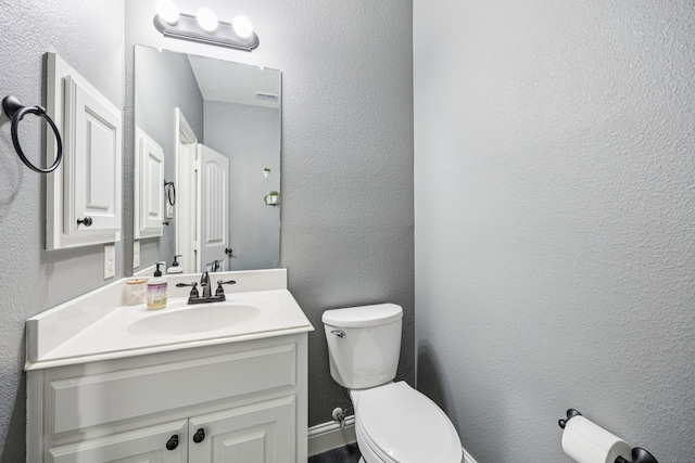 1017 Appalachian Ln, Savannah, TX 76227 - half bathroom with vanity and a textured wall