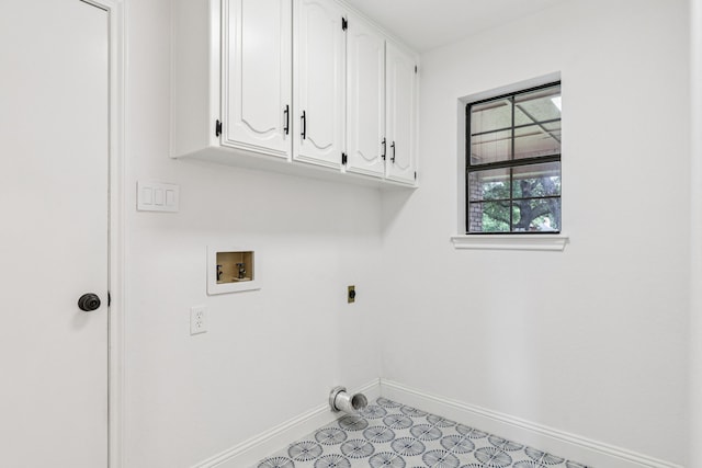 810 Quail Run, Keller, TX 76248 - washroom featuring cabinet space, hookup for a washing machine, and electric dryer hookup