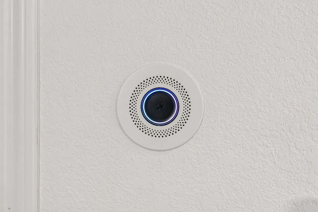 810 Quail Run, Keller, TX 76248 - detailed view of a smoke detector