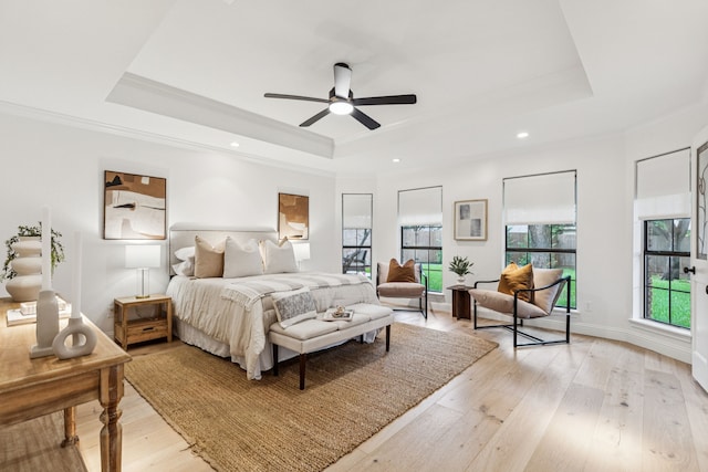 810 Quail Run, Keller, TX 76248 - bedroom with a tray ceiling, crown molding, light wood-type flooring, recessed lighting, and ceiling fan