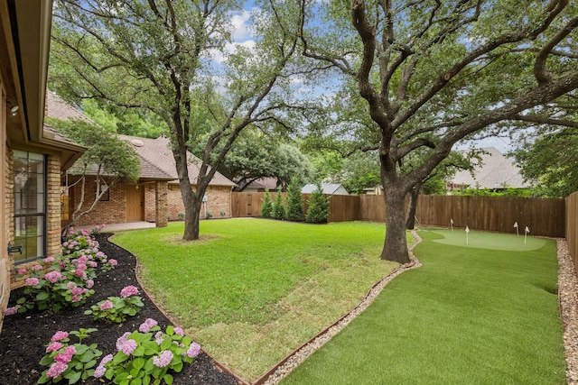 810 Quail Run, Keller, TX 76248 - fenced backyard featuring an area to practice putting