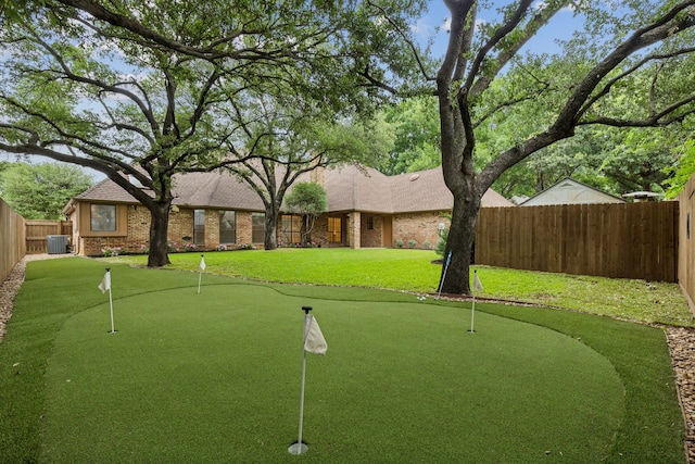810 Quail Run, Keller, TX 76248 - view of property's community featuring a putting area and a fenced backyard