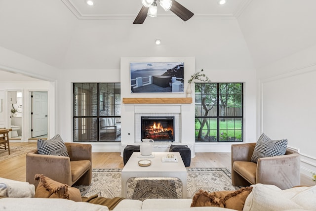 810 Quail Run, Keller, TX 76248 - living room with a brick fireplace, wood finished floors, ceiling fan, ornamental molding, and recessed lighting