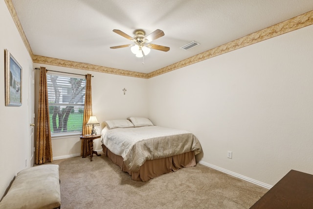 495 Bending Oaks Trl, Rockwall, TX 75087 - bedroom featuring light colored carpet and a ceiling fan