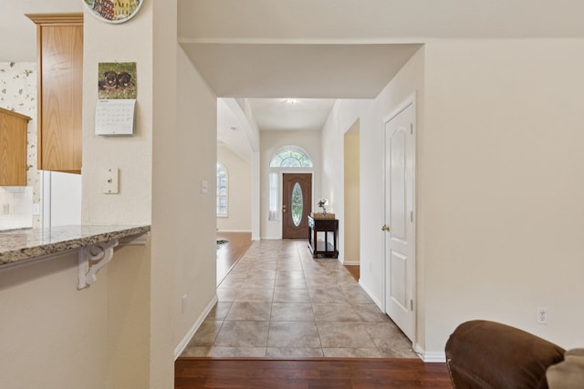 495 Bending Oaks Trl, Rockwall, TX 75087 - foyer entrance with baseboards and light wood-type flooring