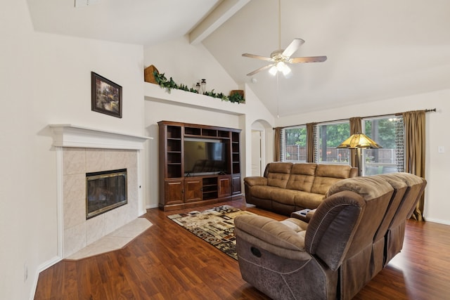 495 Bending Oaks Trl, Rockwall, TX 75087 - living area with ceiling fan, wood finished floors, beam ceiling, high vaulted ceiling, and a tiled fireplace