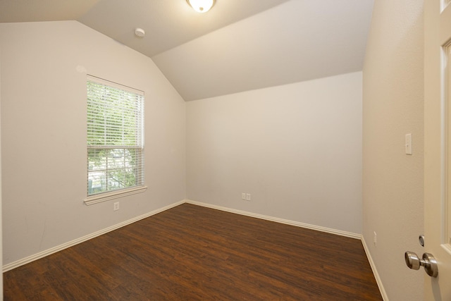 2111 Rains County Rd, Forney, TX 75126 - additional living space featuring vaulted ceiling and dark wood finished floors