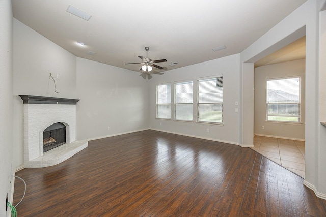 2111 Rains County Rd, Forney, TX 75126 - unfurnished living room featuring a ceiling fan, healthy amount of natural light, and hardwood / wood-style flooring