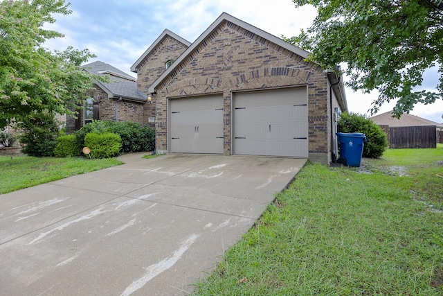 2111 Rains County Rd, Forney, TX 75126 - view of front of property with driveway, a garage, and brick siding