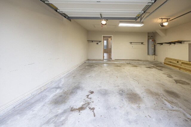 2111 Rains County Rd, Forney, TX 75126 - garage with electric water heater and a garage door opener