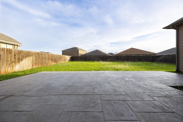 2111 Rains County Rd, Forney, TX 75126 - fenced backyard with a patio
