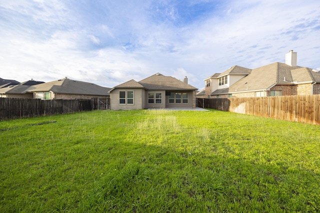 2111 Rains County Rd, Forney, TX 75126 - back of property featuring a fenced backyard and a patio area