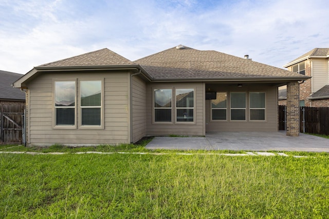 2111 Rains County Rd, Forney, TX 75126 - back of property with a patio area and roof with shingles