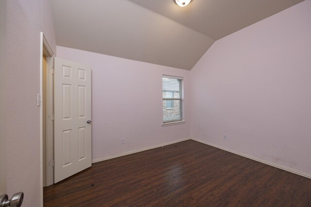 2111 Rains County Rd, Forney, TX 75126 - bonus room featuring dark wood-style floors and lofted ceiling