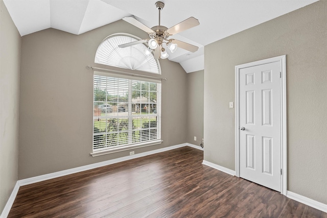519 Kristi St, Robinson, TX 76706 - spare room with vaulted ceiling, a ceiling fan, and dark wood-style flooring