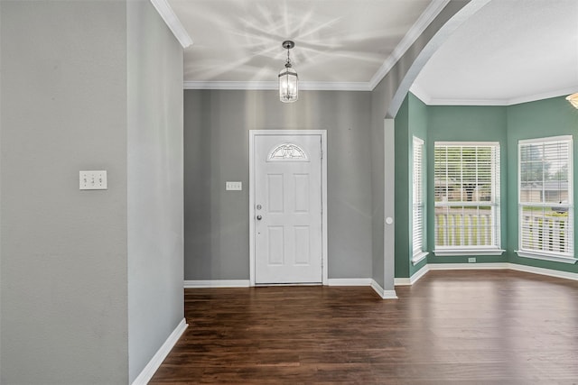 519 Kristi St, Robinson, TX 76706 - foyer entrance with dark wood-type flooring, arched walkways, and ornamental molding
