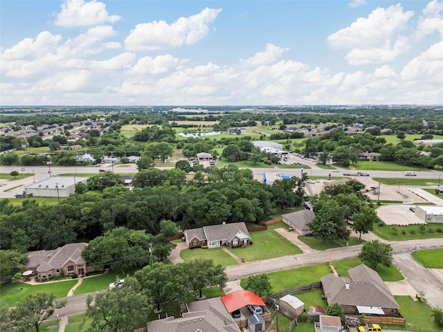 519 Kristi St, Robinson, TX 76706 - aerial perspective of suburban area featuring a tree filled landscape