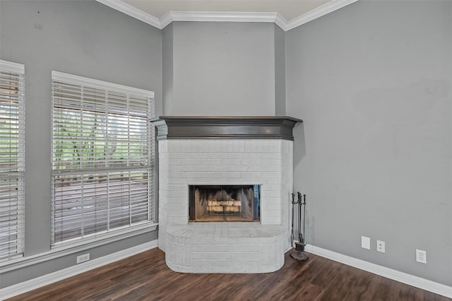 519 Kristi St, Robinson, TX 76706 - detailed view of wood finished floors, crown molding, and a fireplace
