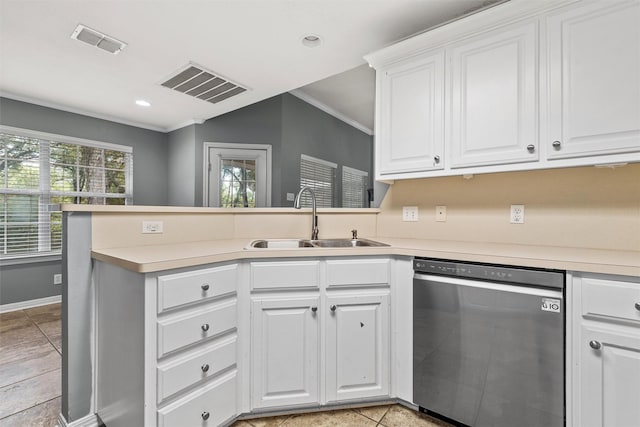 519 Kristi St, Robinson, TX 76706 - kitchen with stainless steel dishwasher, a peninsula, white cabinets, light countertops, and crown molding