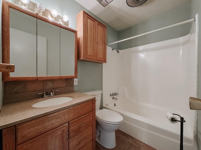 220 Hampton Ave, Corsicana, TX 75110 - bathroom featuring vanity, tile patterned flooring, and bathing tub / shower combination