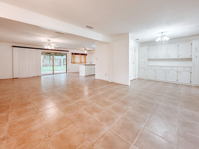 220 Hampton Ave, Corsicana, TX 75110 - unfurnished living room with light tile patterned floors and a ceiling fan