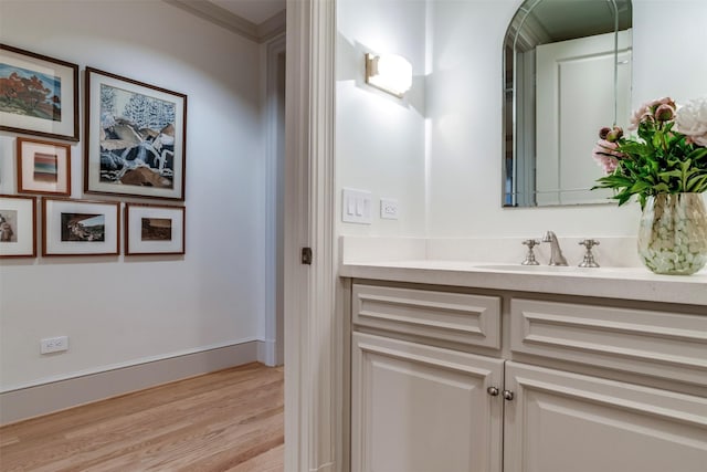 3505 Turtle Creek Blvd Unit 2A, Dallas, TX 75219 - bathroom with vanity and wood finished floors