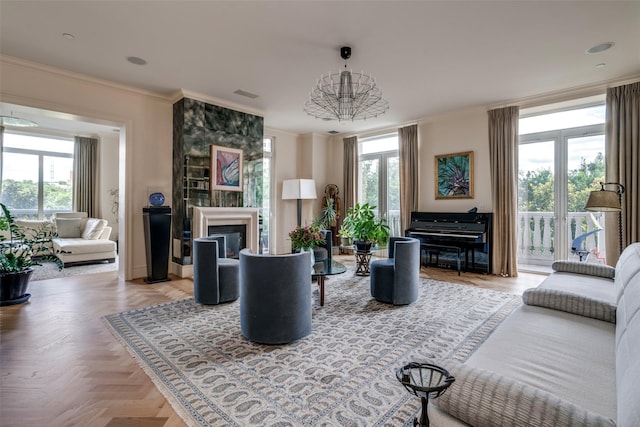 3505 Turtle Creek Blvd Unit 2A, Dallas, TX 75219 - living area featuring a glass covered fireplace, crown molding, and a chandelier