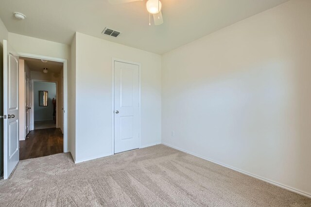 9263 Summerlee St, Dallas, TX 75227 - unfurnished bedroom featuring carpet flooring and a ceiling fan