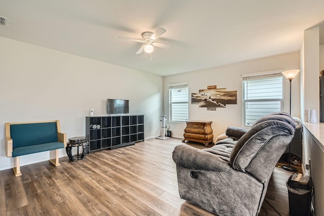 9263 Summerlee St, Dallas, TX 75227 - living room with a ceiling fan, plenty of natural light, and wood finished floors