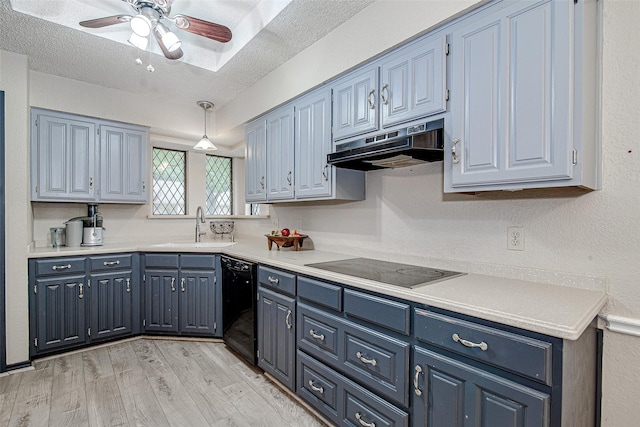 5307 Oak Branch Dr, Arlington, TX 76016 - kitchen with under cabinet range hood, black appliances, blue cabinetry, a ceiling fan, and a textured ceiling