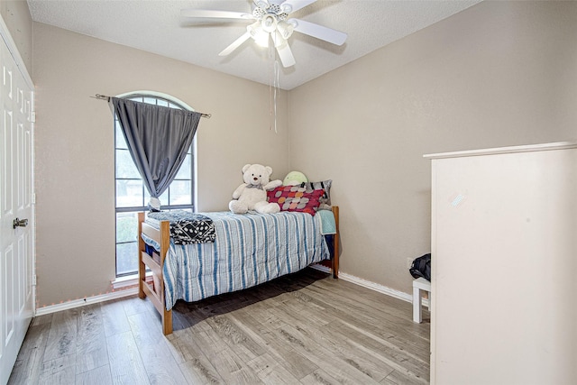 5307 Oak Branch Dr, Arlington, TX 76016 - bedroom with wood finished floors and a ceiling fan