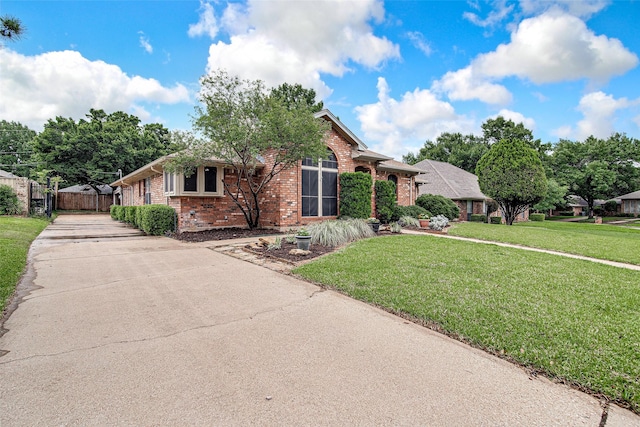 5307 Oak Branch Dr, Arlington, TX 76016 - single story home featuring brick siding and concrete driveway