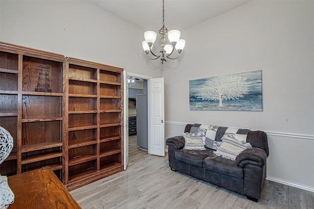 5307 Oak Branch Dr, Arlington, TX 76016 - living area with a chandelier and wood finished floors