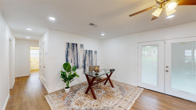 1608 Holt St, Fort Worth, TX 76103 - office area featuring wood finished floors, french doors, healthy amount of natural light, and recessed lighting