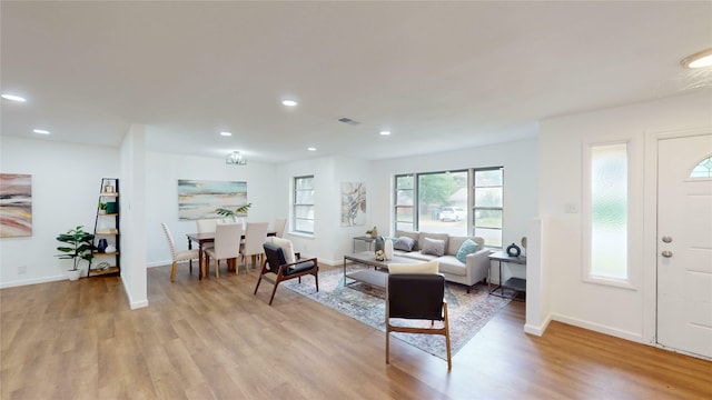 1608 Holt St, Fort Worth, TX 76103 - living room with light wood finished floors and recessed lighting