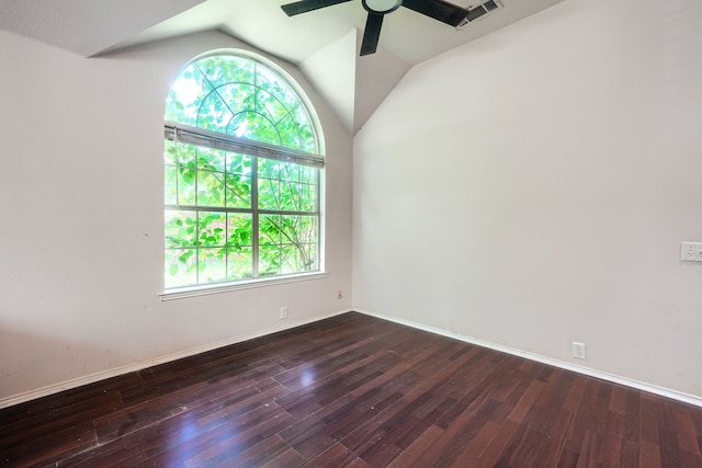 703 Monterey Dr, Rockwall, TX 75087 - unfurnished room with healthy amount of natural light, dark wood finished floors, ceiling fan, and vaulted ceiling