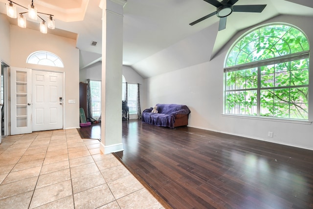 703 Monterey Dr, Rockwall, TX 75087 - foyer entrance with a ceiling fan, lofted ceiling, and wood finished floors