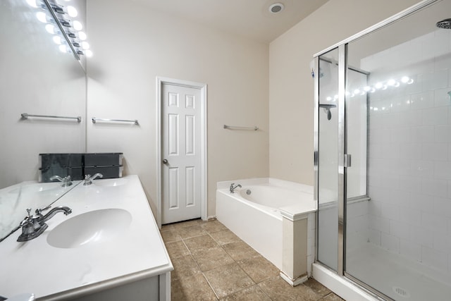 703 Monterey Dr, Rockwall, TX 75087 - bathroom with a garden tub, a shower stall, and double vanity