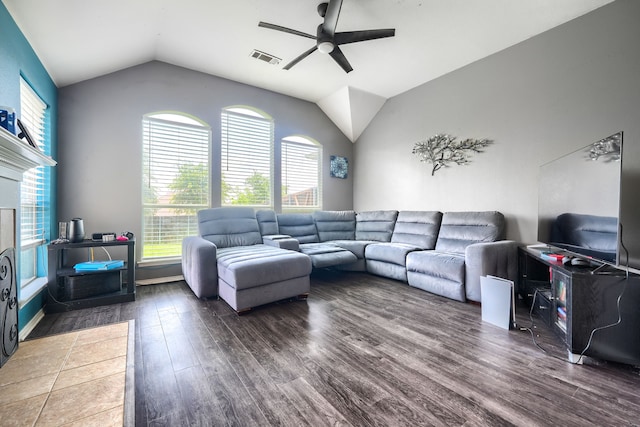703 Monterey Dr, Rockwall, TX 75087 - living room with a ceiling fan, wood finished floors, and vaulted ceiling