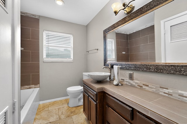 5417 Jane Anne St, Haltom City, TX 76117 - full bathroom featuring vanity, decorative backsplash, stone tile flooring, bathtub / shower combination, and recessed lighting