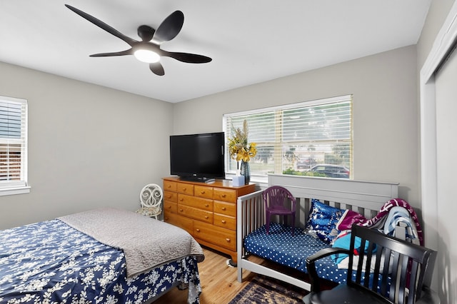 5417 Jane Anne St, Haltom City, TX 76117 - bedroom featuring wood finished floors and a ceiling fan