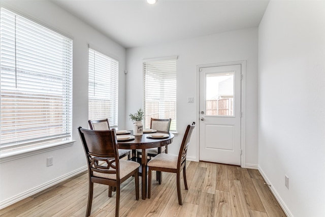 1233 Western Yarrow Ave, Justin, TX 76247 - dining space featuring light wood finished floors and baseboards