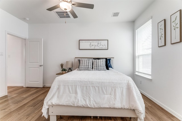 1233 Western Yarrow Ave, Justin, TX 76247 - bedroom with wood finished floors and a ceiling fan