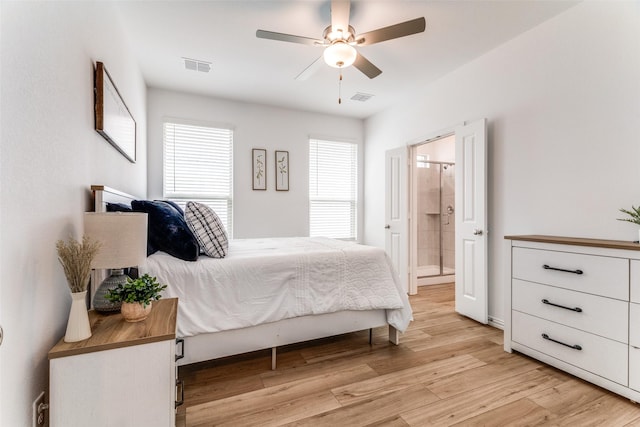 1233 Western Yarrow Ave, Justin, TX 76247 - bedroom with light wood-type flooring, ensuite bath, and a ceiling fan