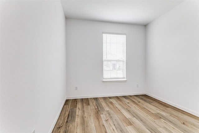 1233 Western Yarrow Ave, Justin, TX 76247 - spare room with light wood-style floors and baseboards
