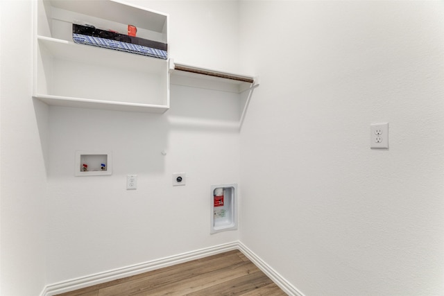 1233 Western Yarrow Ave, Justin, TX 76247 - laundry area featuring washer hookup, electric dryer hookup, wood finished floors, and gas dryer hookup