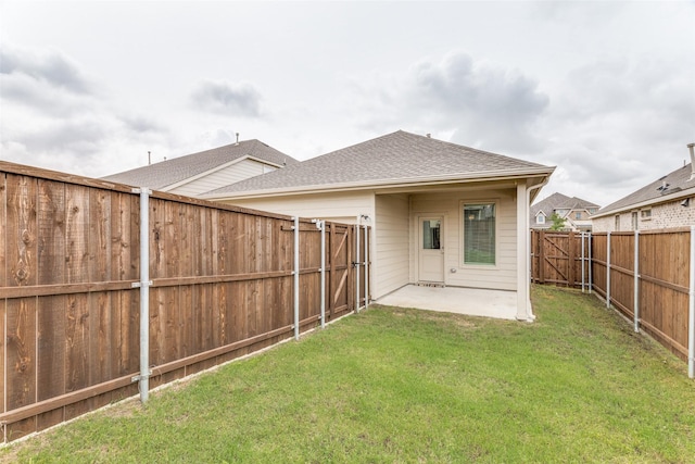 1233 Western Yarrow Ave, Justin, TX 76247 - rear view of house with a patio, a fenced backyard, roof with shingles, and a gate