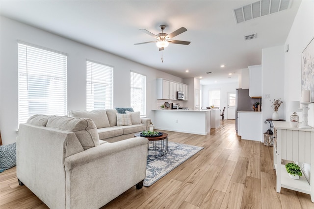 1233 Western Yarrow Ave, Justin, TX 76247 - living area featuring ceiling fan, light wood-style flooring, and recessed lighting